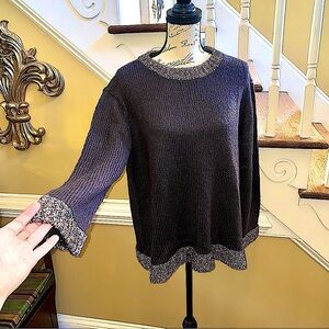 Alison Andrew’s festive tinsel sparkle trim sweater